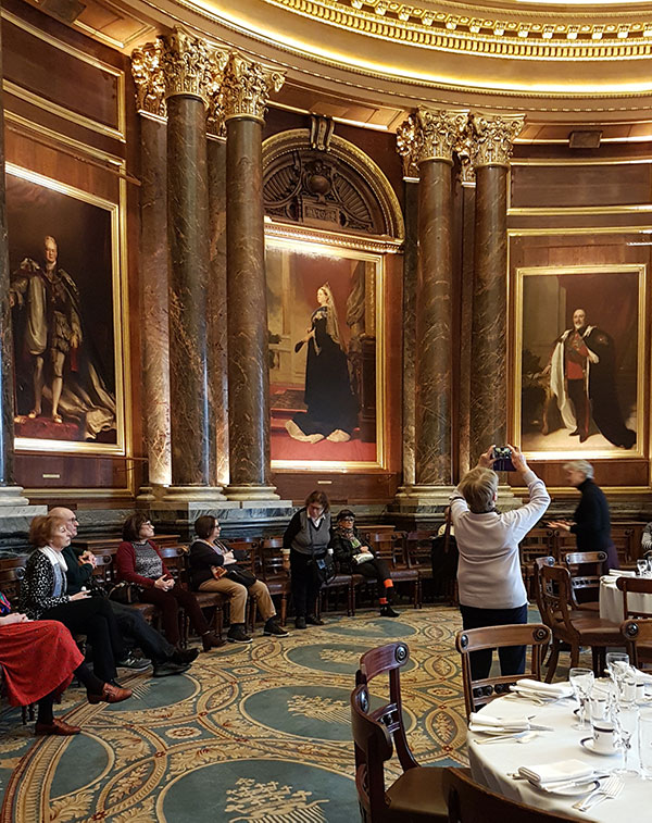 Dining room inside Drapers Hall with portrait of Queen Victoria
