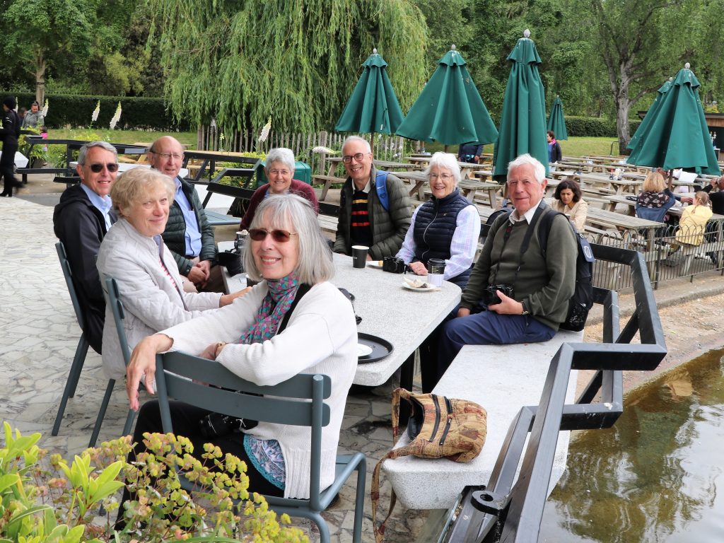 Members of the photo group enjoying a drink in the open air