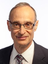 Bald man in glasses