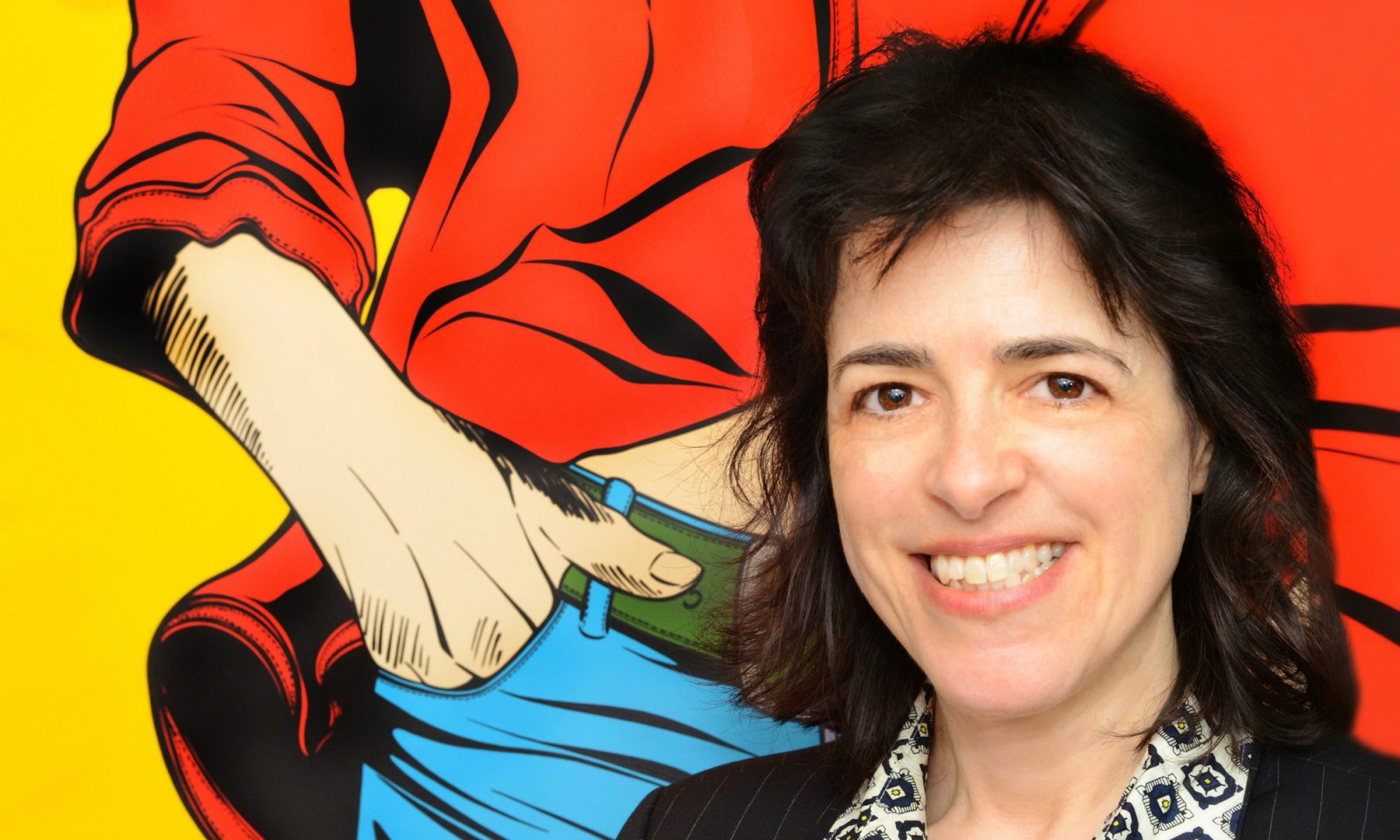 Woman with long black hair standing in front of painting of person with blue trousers and red shirt